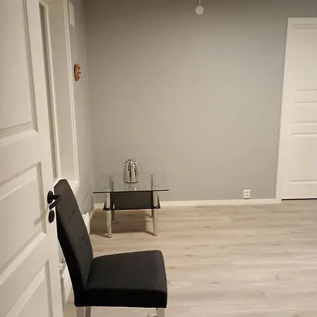комната в апартаментах с террасой и барбекю в саду Quarto em Acomodações Particulares