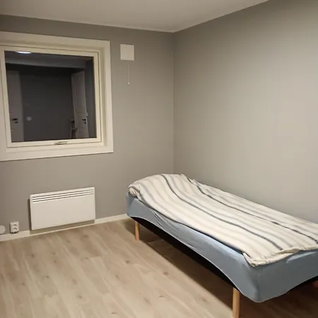 Quarto em Acomodações Particulares комната в апартаментах с террасой и барбекю в саду *