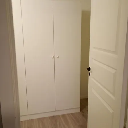 Quarto em Acomodações Particulares комната в апартаментах с террасой и барбекю в саду *